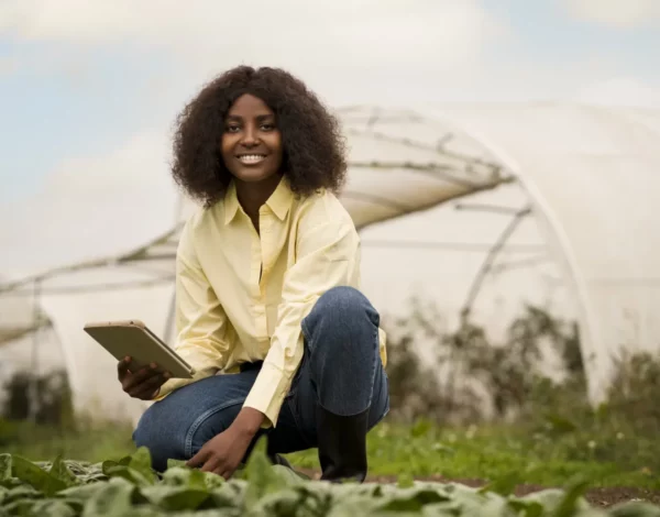 full-shot-smiley-woman-holding-tablet